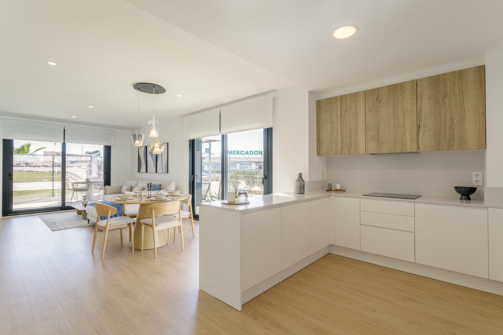 Modern kitchen and living area with sea views in a 2-bedroom apartment in Torrevieja - The Estates