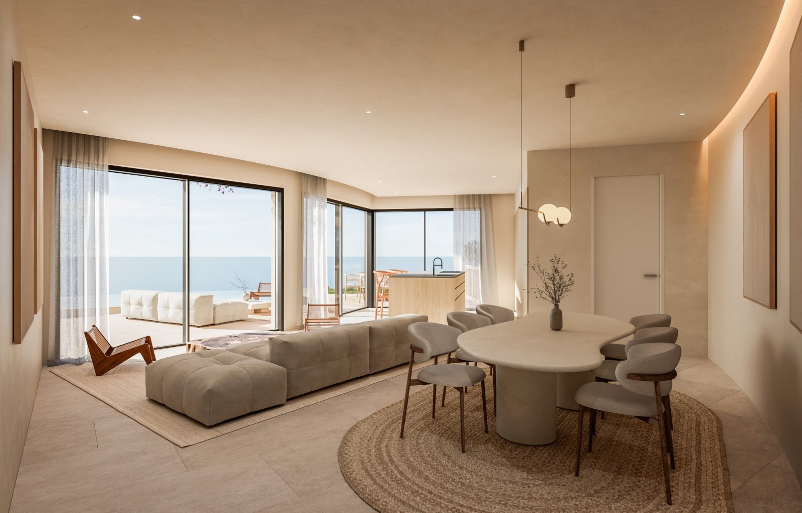 Open-plan living, dining and kitchen area with panoramic sea views in a 4-bedroom villa in Jávea - The Estates