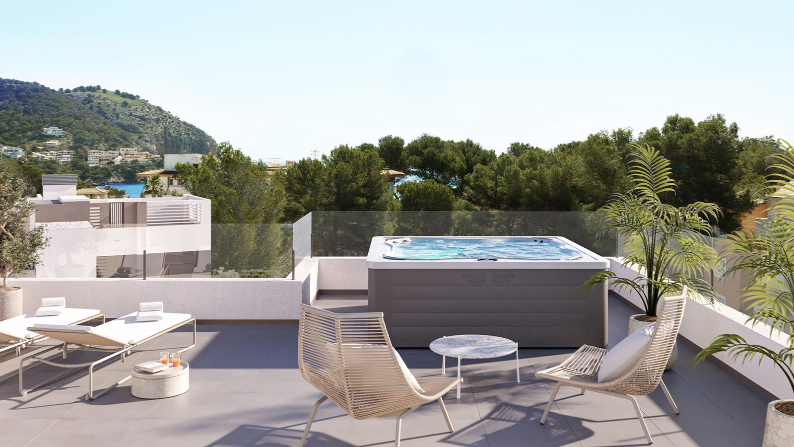 Rooftop terrace with a hot tub, loungers and mountain views of Canyamel in Mallorca for a 2-bedroom apartment in Capdepera - The Estates