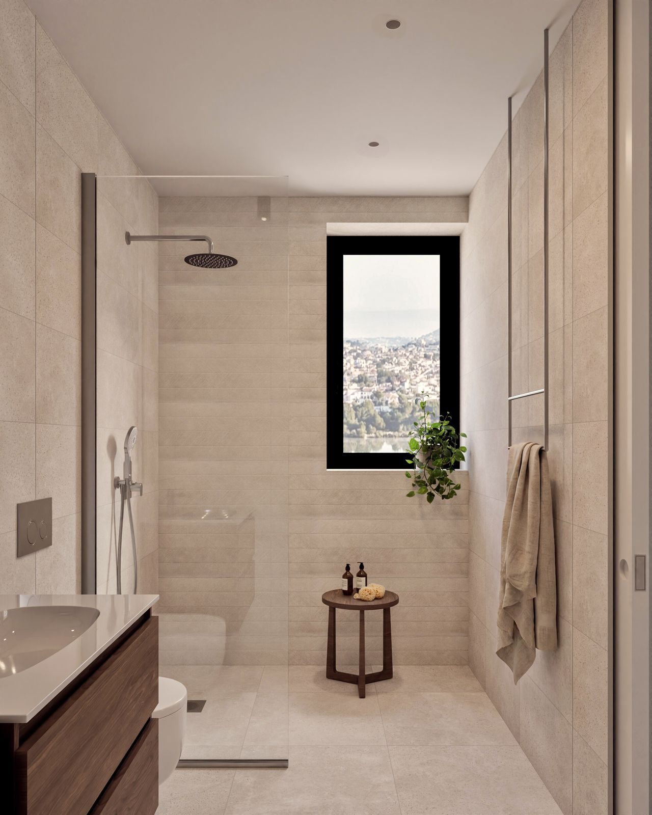 Modern tiled bathroom with walk-in shower, vanity and city views through the window in a 2-bedroom apartment in Calpe - The Estates