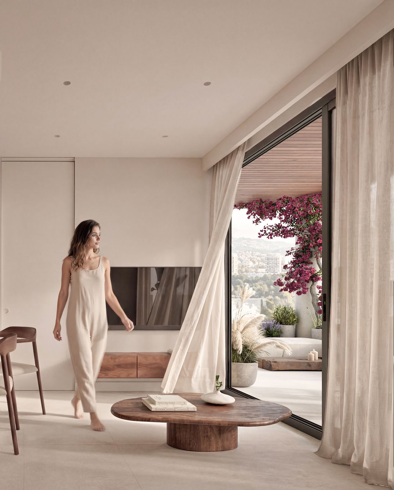 Bright living room opening onto a landscaped terrace with garden and city views of a 2-bedroom apartment in Calpe - The Estates