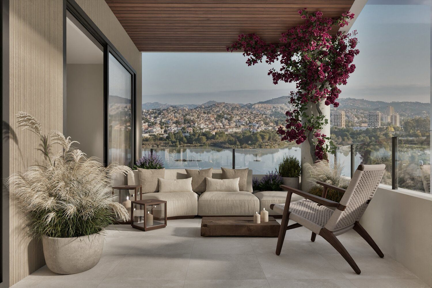 Covered terrace with seating, planters and city views of a 2-bedroom apartment in Calpe - The Estates