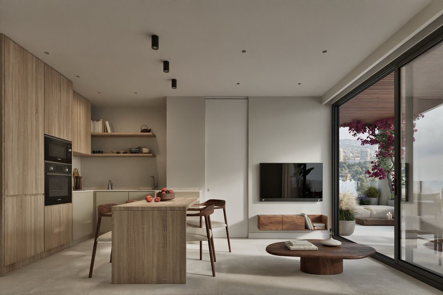 Open-plan kitchen and living room with island, dining area and garden views in a 2-bedroom apartment in Calpe - The Estates