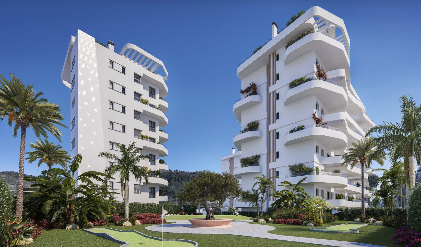 Exterior view of a modern 2-bedroom apartment building with sea views in Villajoyosa - The Estates