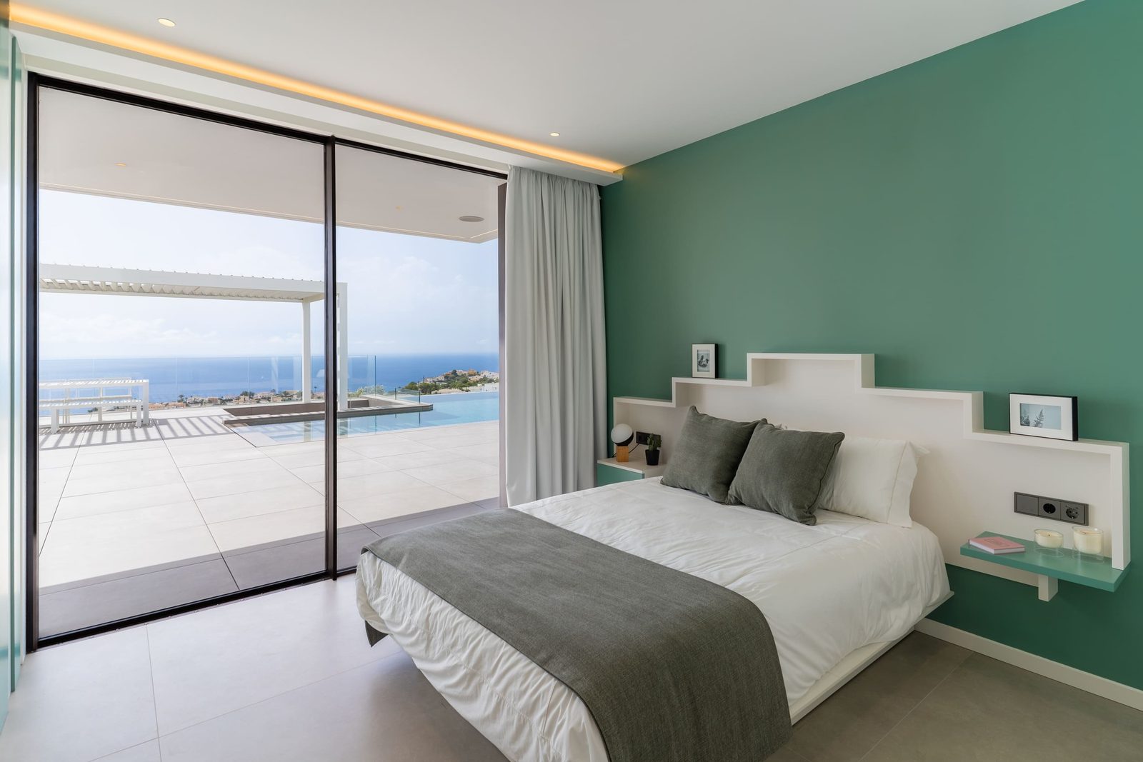 A stylish bedroom with sea views in a 5-bedroom villa in Benitachell - The Estates