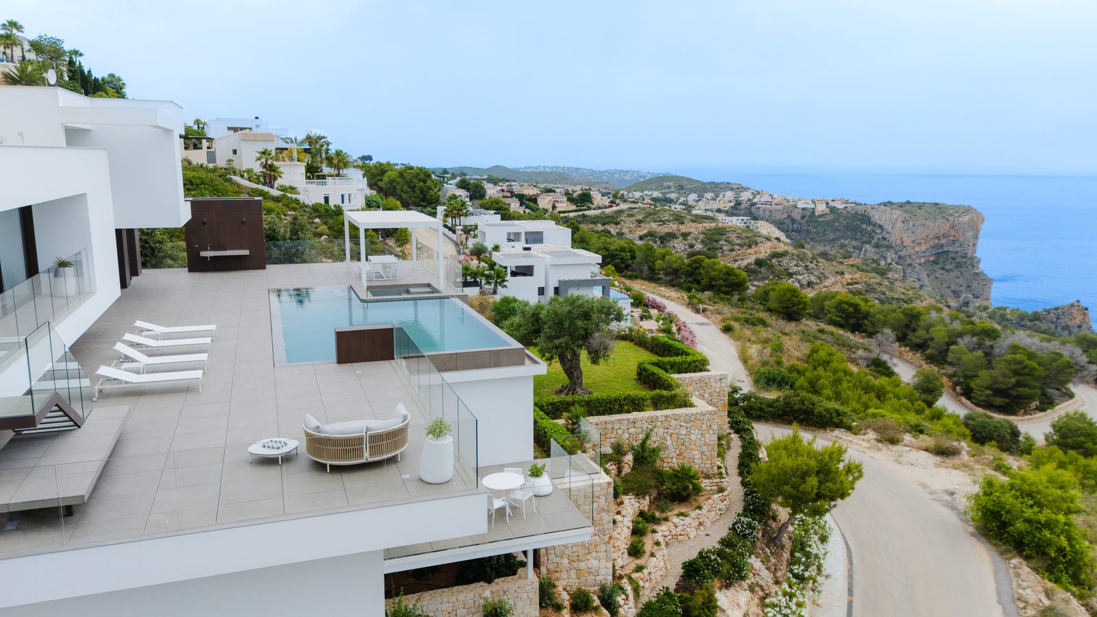 Stunning sea and mountain views from the terrace of a 5-bedroom villa in Benitachell - The Estates