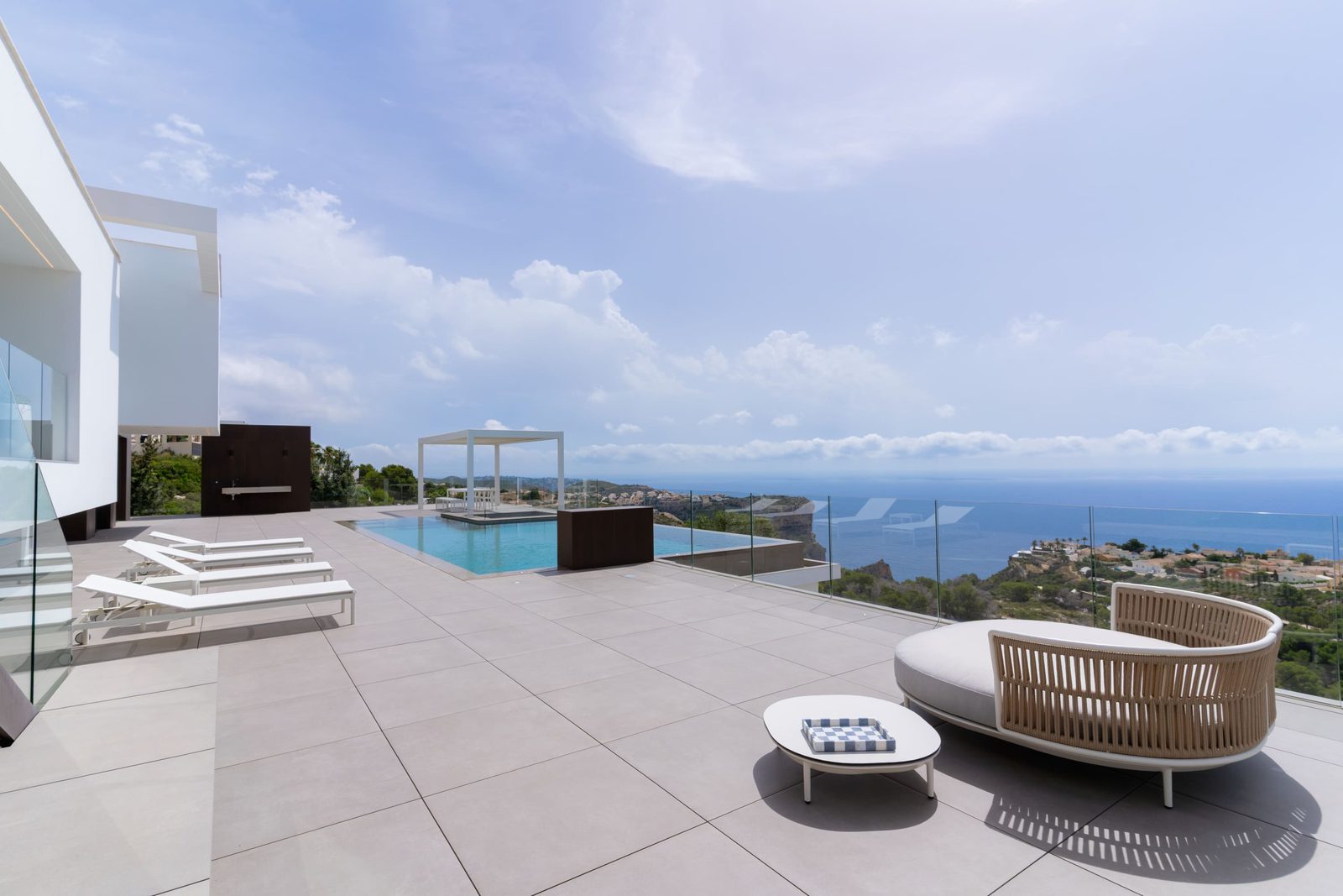 Stunning pool and terrace with panoramic sea views of a 5-bedroom villa in Benitachell - The Estates