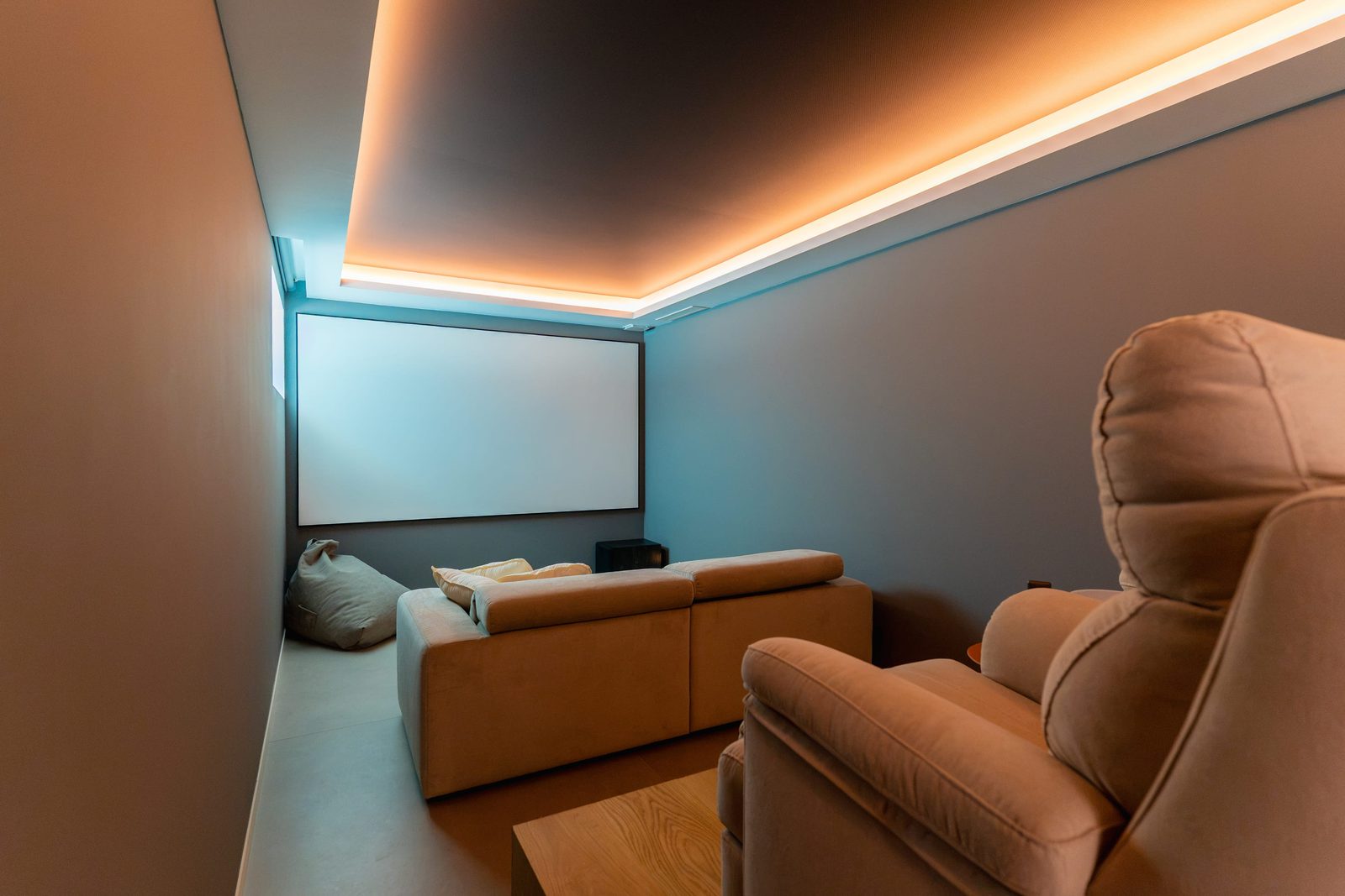 A modern home cinema room with comfortable seating in a 5-bedroom villa in Benitachell - The Estates