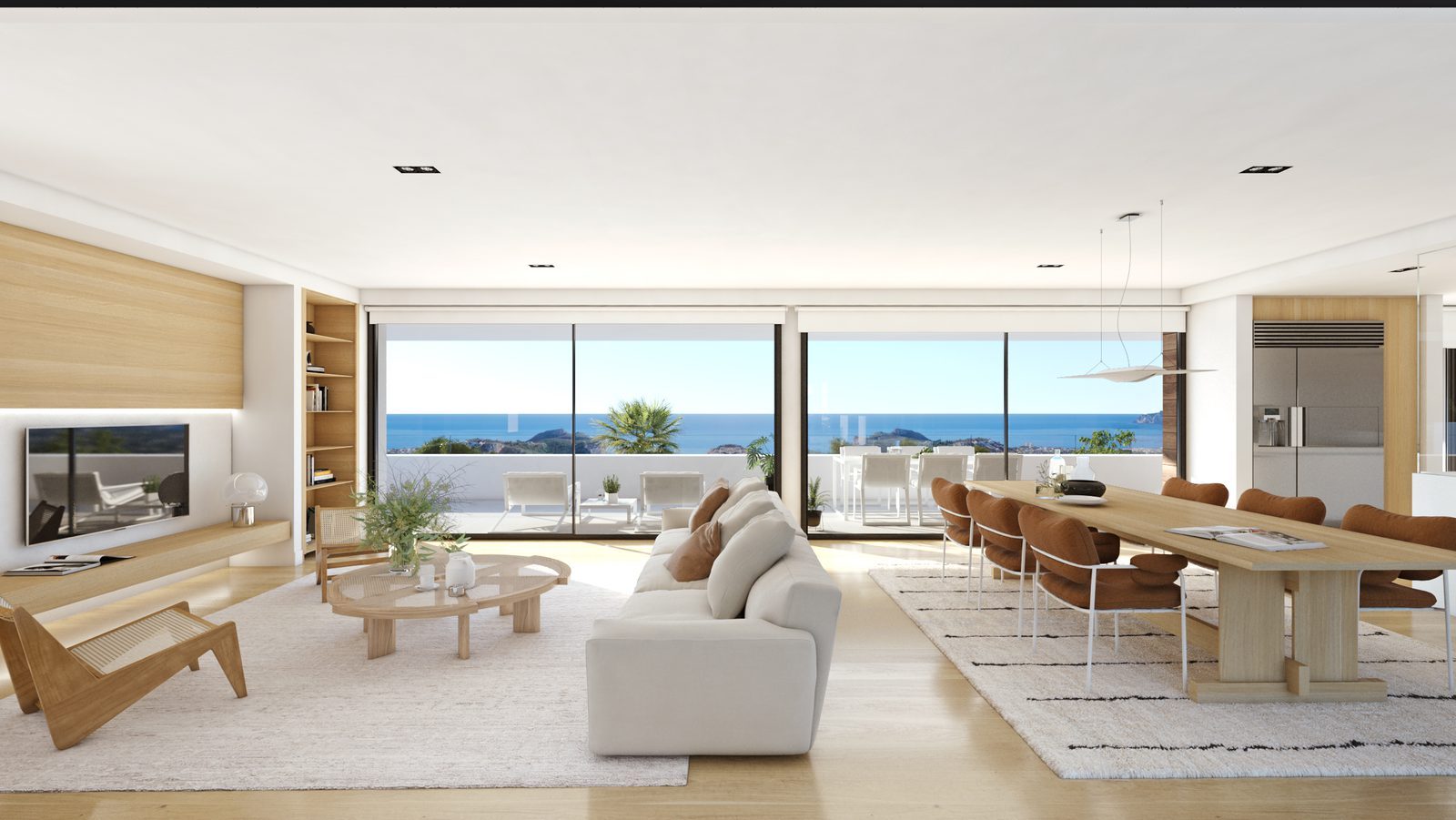 Modern open-plan living and dining area with sea views in a 3-bedroom villa in Benitachell - The Estates