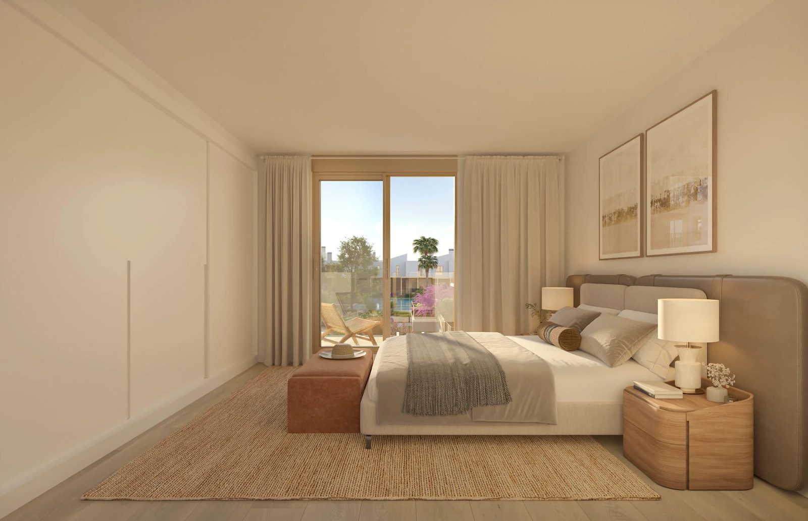 A bright bedroom with a balcony overlooking a garden in a 3-bedroom townhouse in El Verger - The Estates