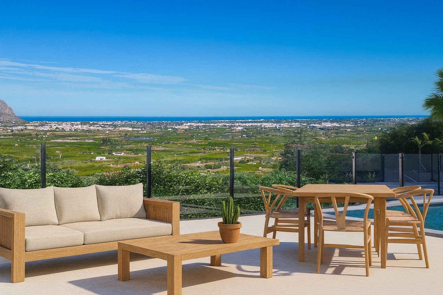Outdoor terrace with lounge seating, dining area and sea, mountain and countryside views of a 3-bedroom villa in Pedreguer - The Estates