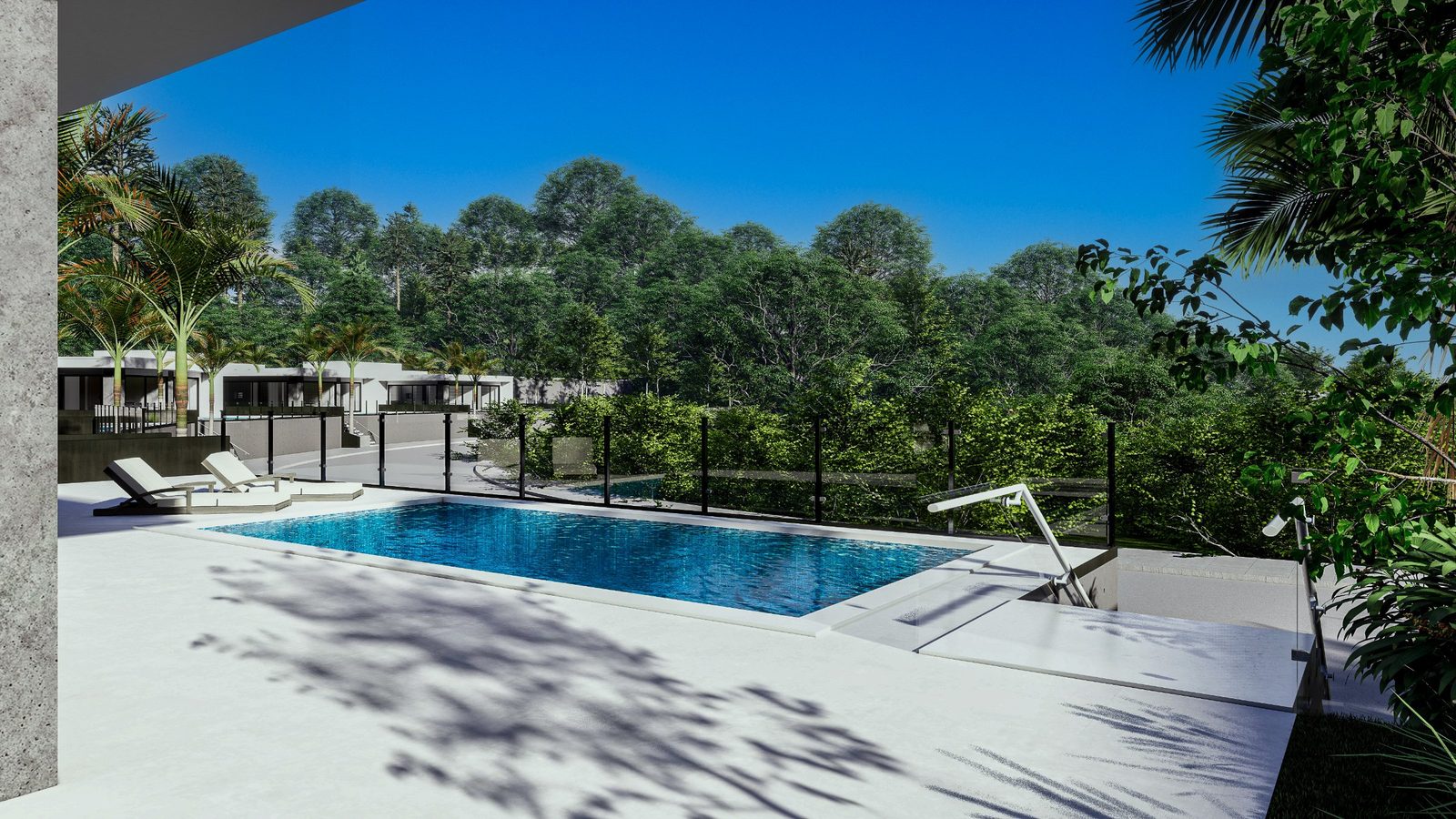 Outdoor swimming pool and sun terrace surrounded by greenery at