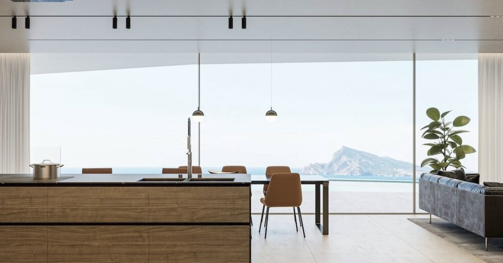 Modern open-plan kitchen and dining area with mountain views of a 4-bedroom villa in Altea - The Estates