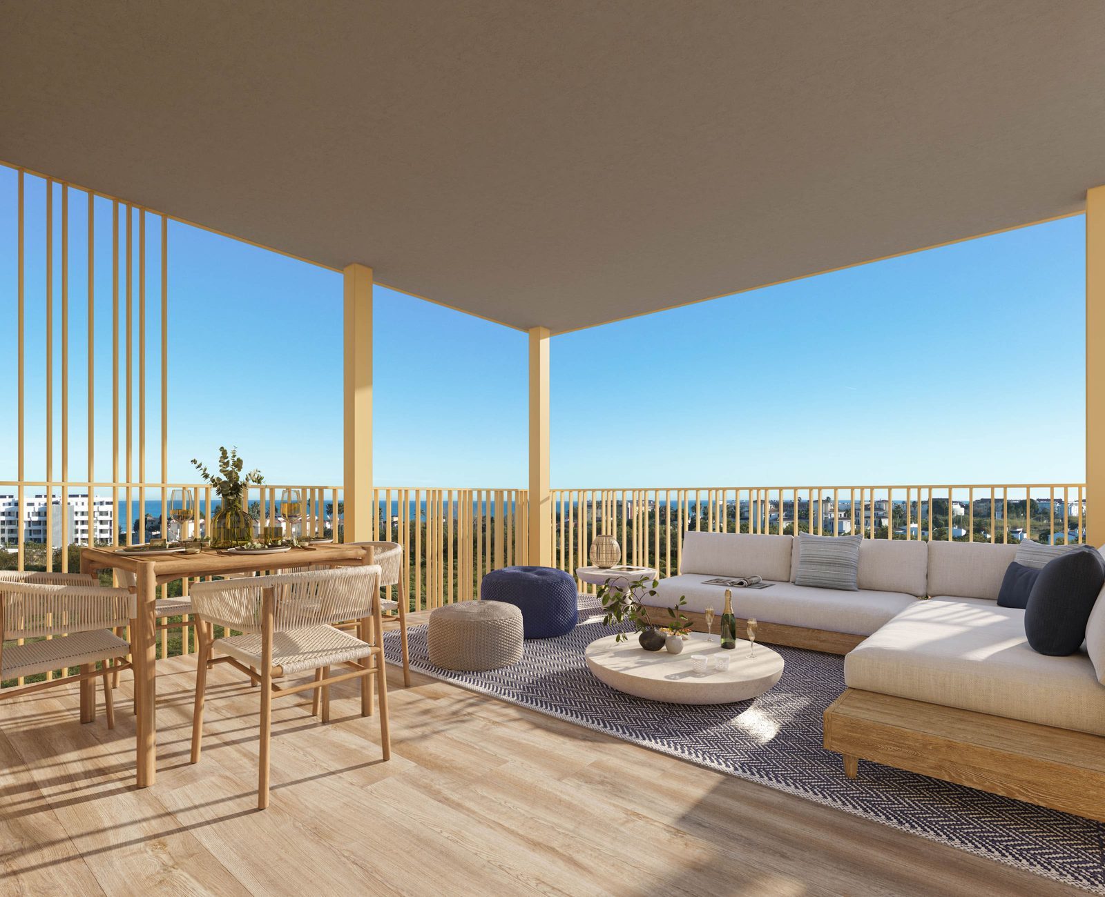 Furnished covered terrace with lounge and dining area overlooking the sea and gardens of a 2-bedroom penthouse in El Verger — The