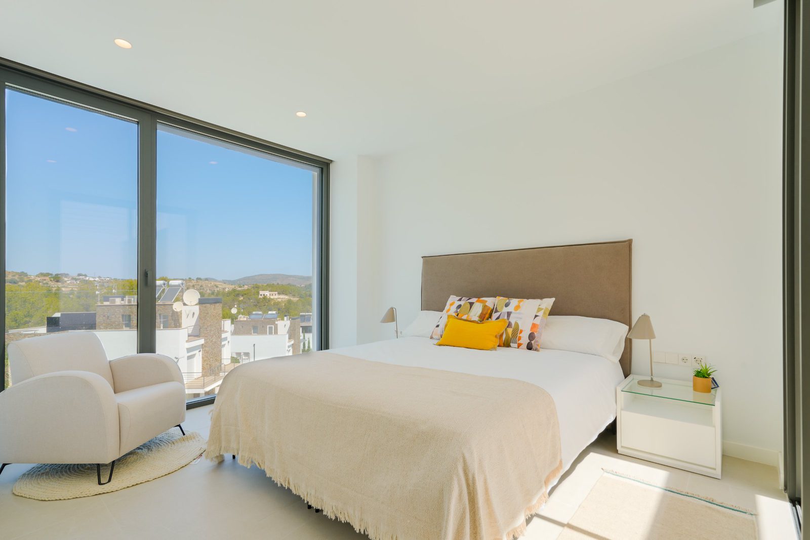 A bright bedroom with countryside views in a 4-bedroom villa in Moraira - The Estates