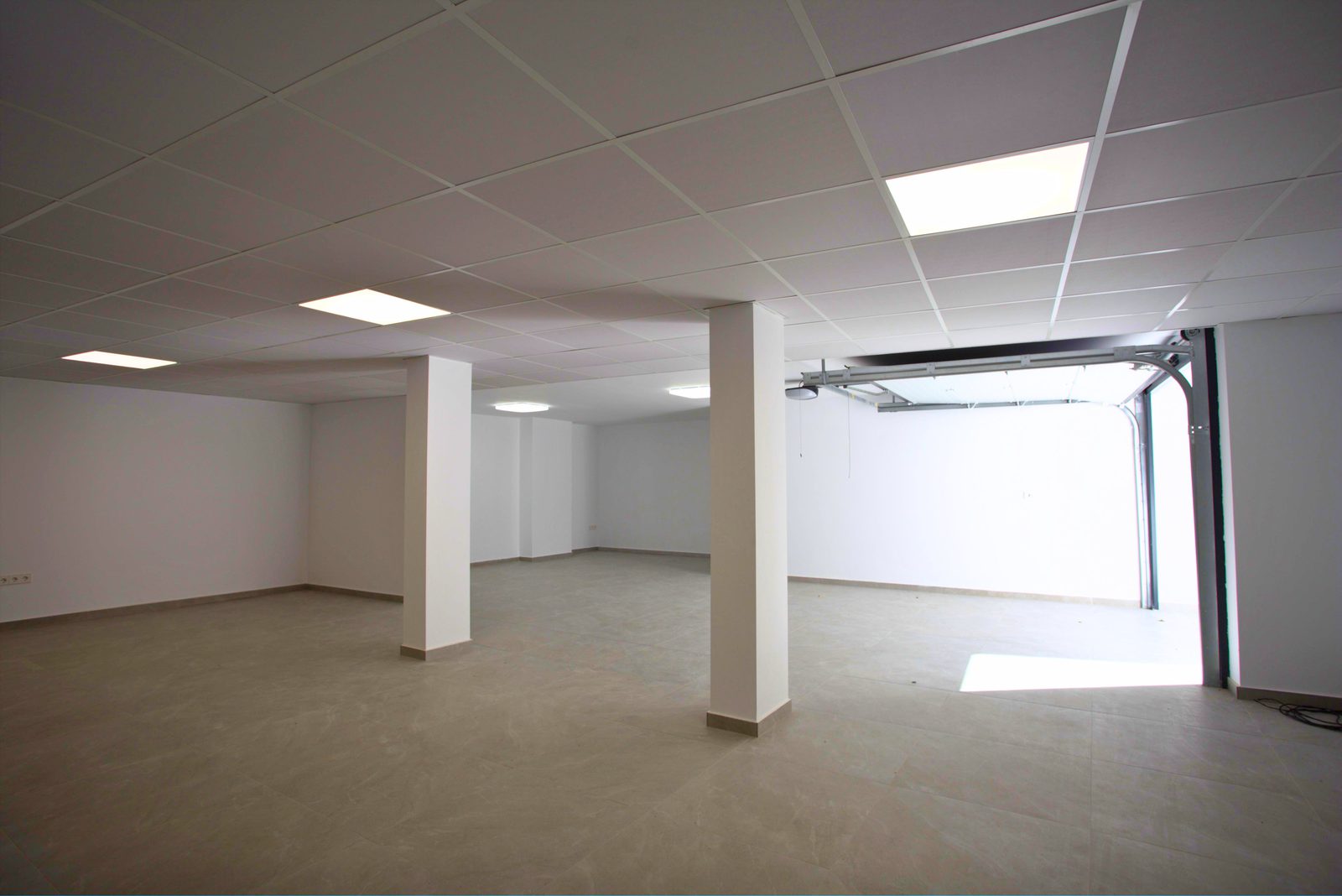 An empty garage space in a 3-bedroom villa in Moraira - The Estates