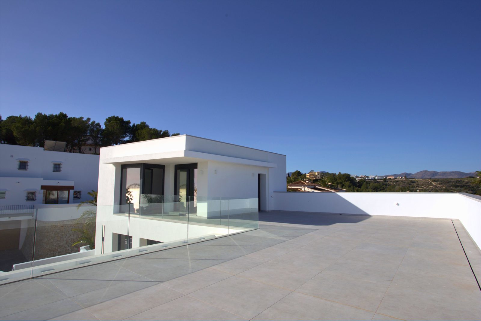 Modern villa exterior with panoramic sea views of a 3-bedroom villa in Moraira - The Estates