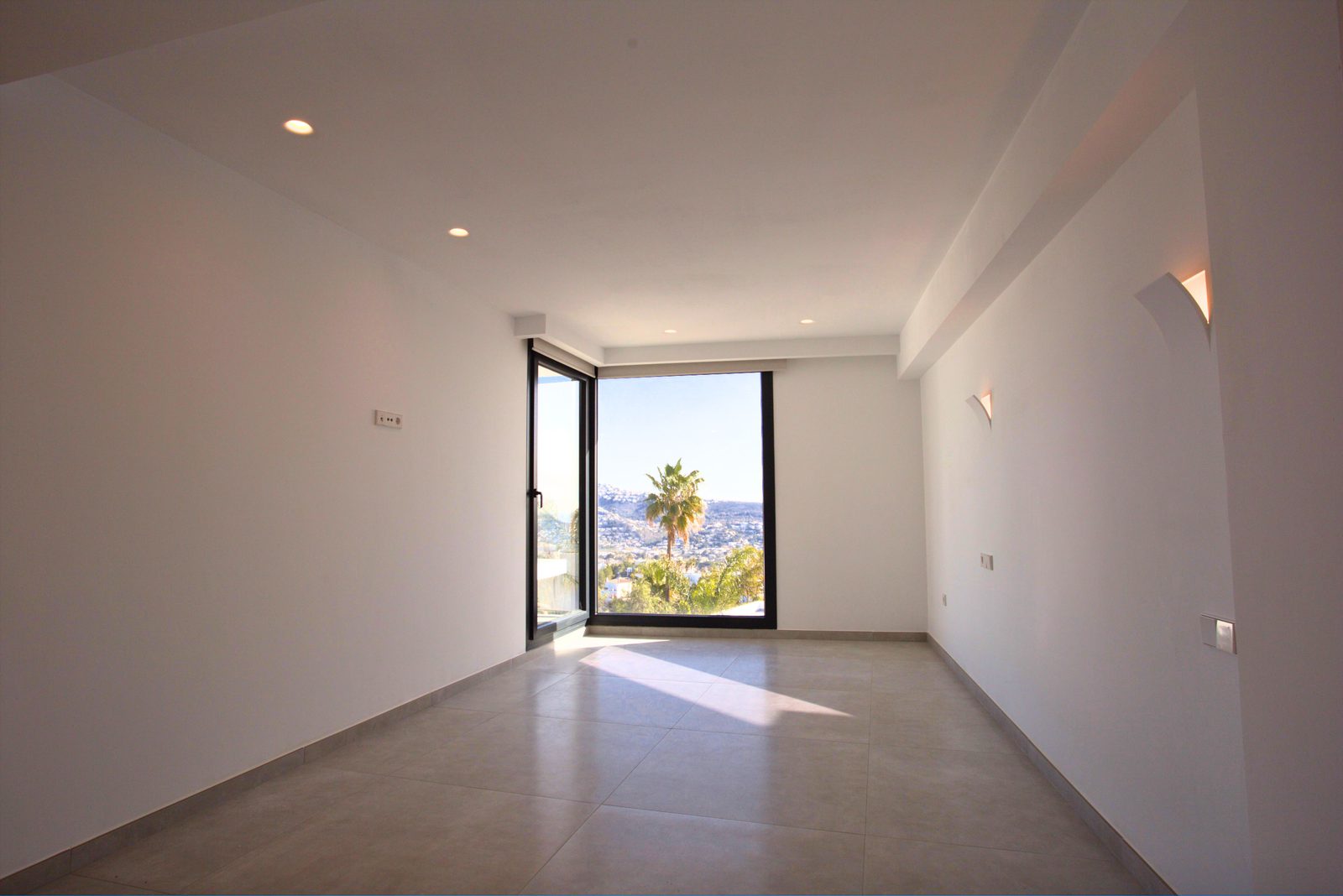 Bright, modern interior with stunning sea views from a 3-bedroom villa in Moraira - The Estates