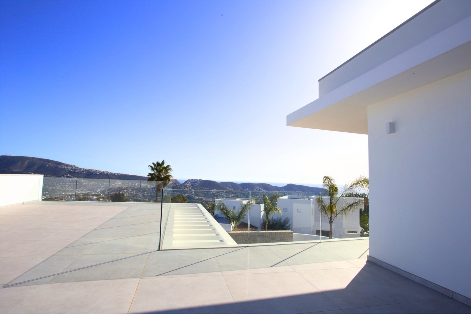 Panoramic sea views from a modern terrace of a 3-bedroom villa in Moraira - The Estates