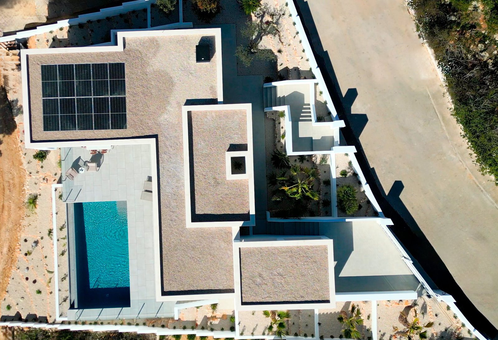 Aerial view of a modern 3-bedroom villa with a pool in Cumbre del Sol, Benitachell - The Estates