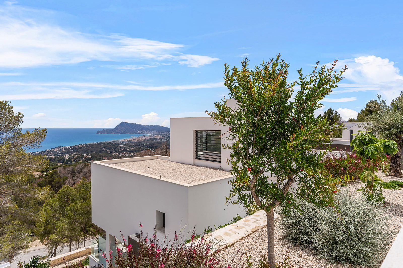 Modern exterior and panoramic sea and mountain views of