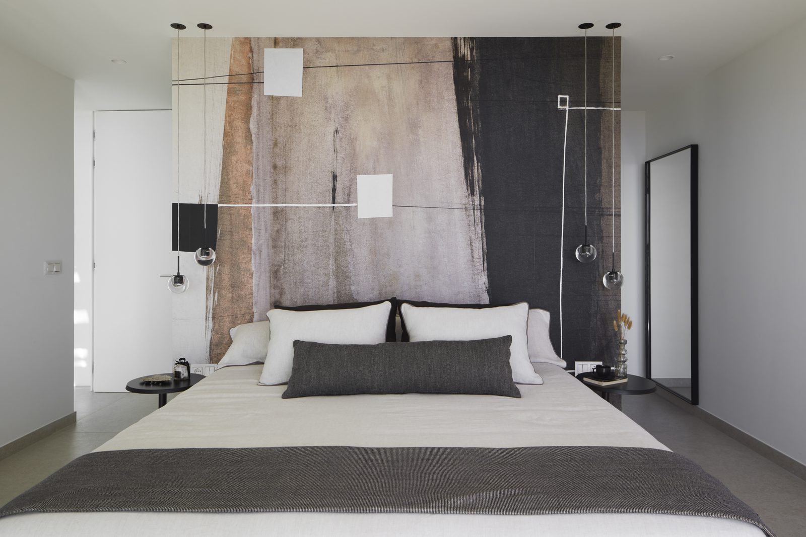 Contemporary bedroom with abstract feature wall and pendant lights in a 4-bedroom villa in Altea - The Estates