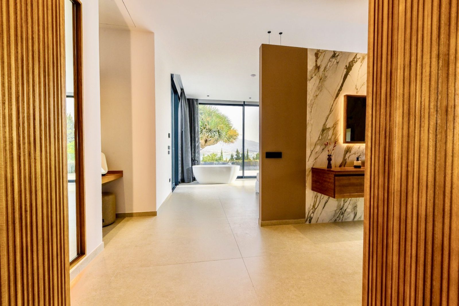 A luxurious bathroom interior with sea views of a 4-bedroom villa in La Nucia - The Estates
