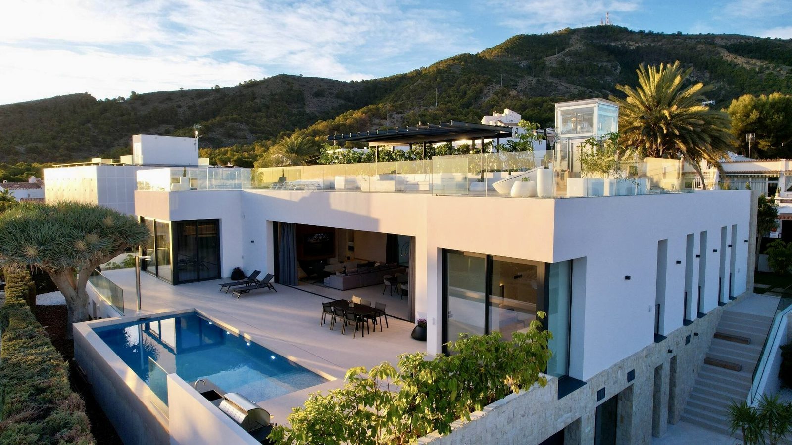 Modern villa with pool and stunning sea and city views in La Nucia - The Estates