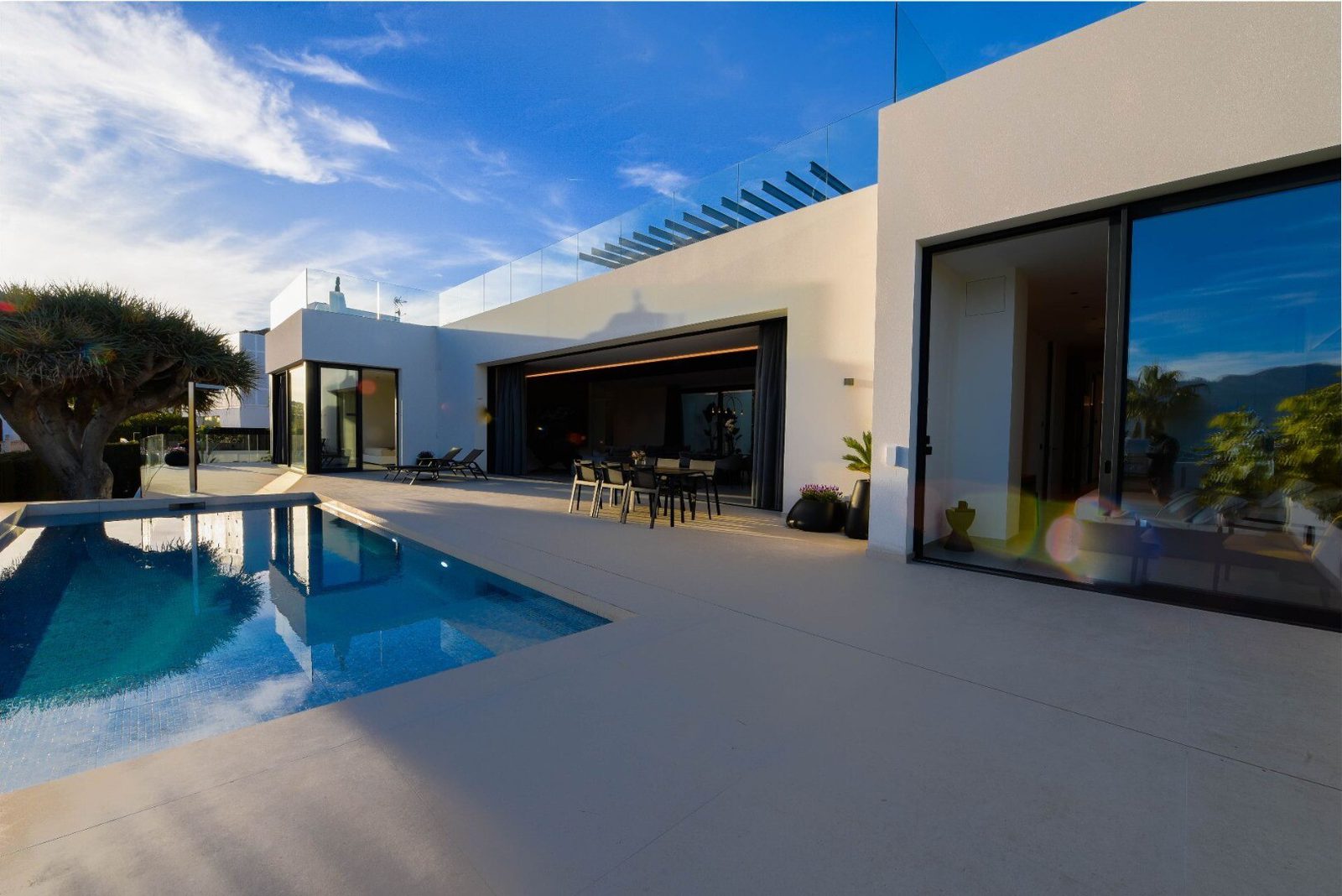 A modern pool and terrace area of a 4-bedroom villa in La Nucia - The Estates