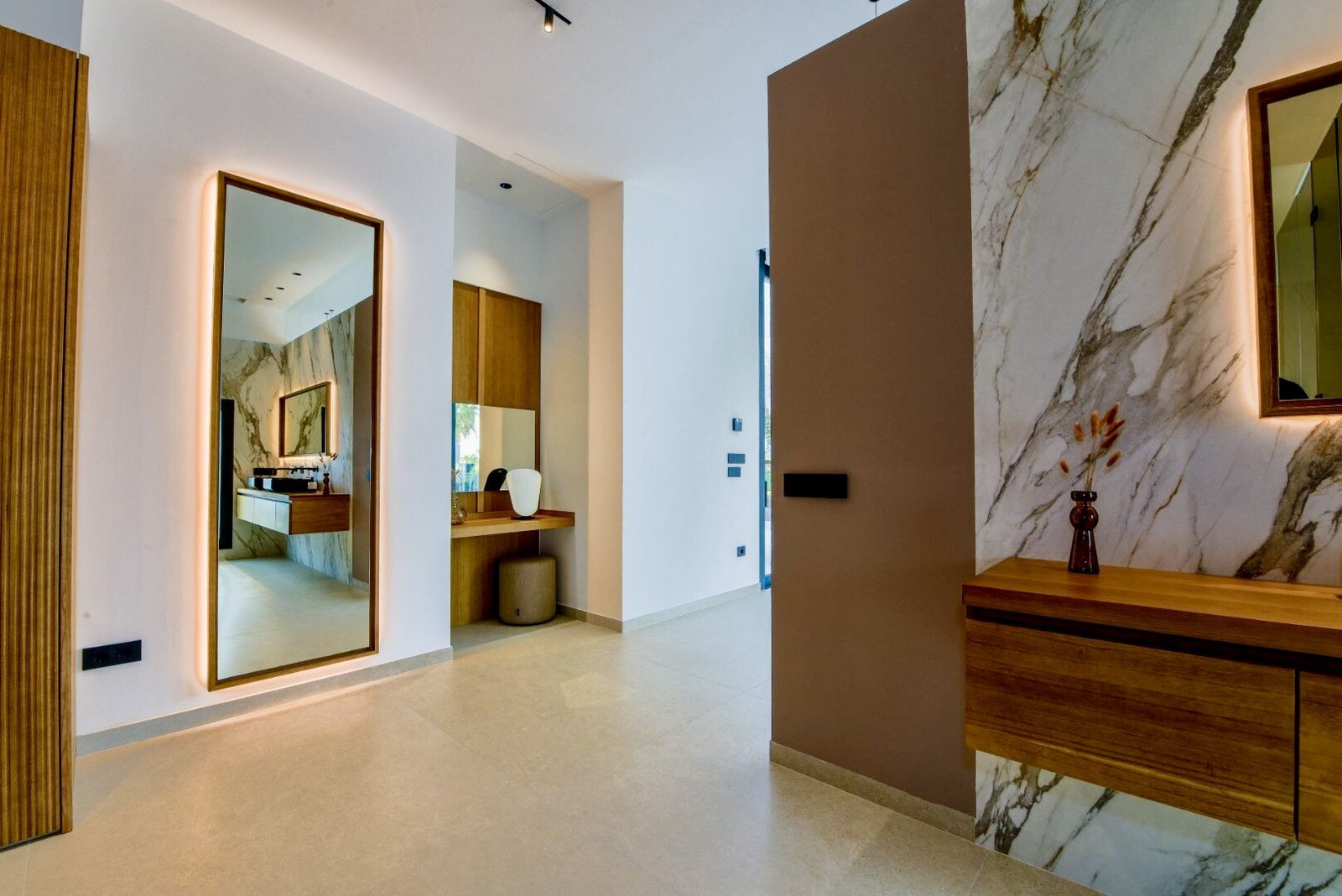 Elegant bathroom interior with marble and wood accents in a 4-bedroom villa in La Nucia - The Estates