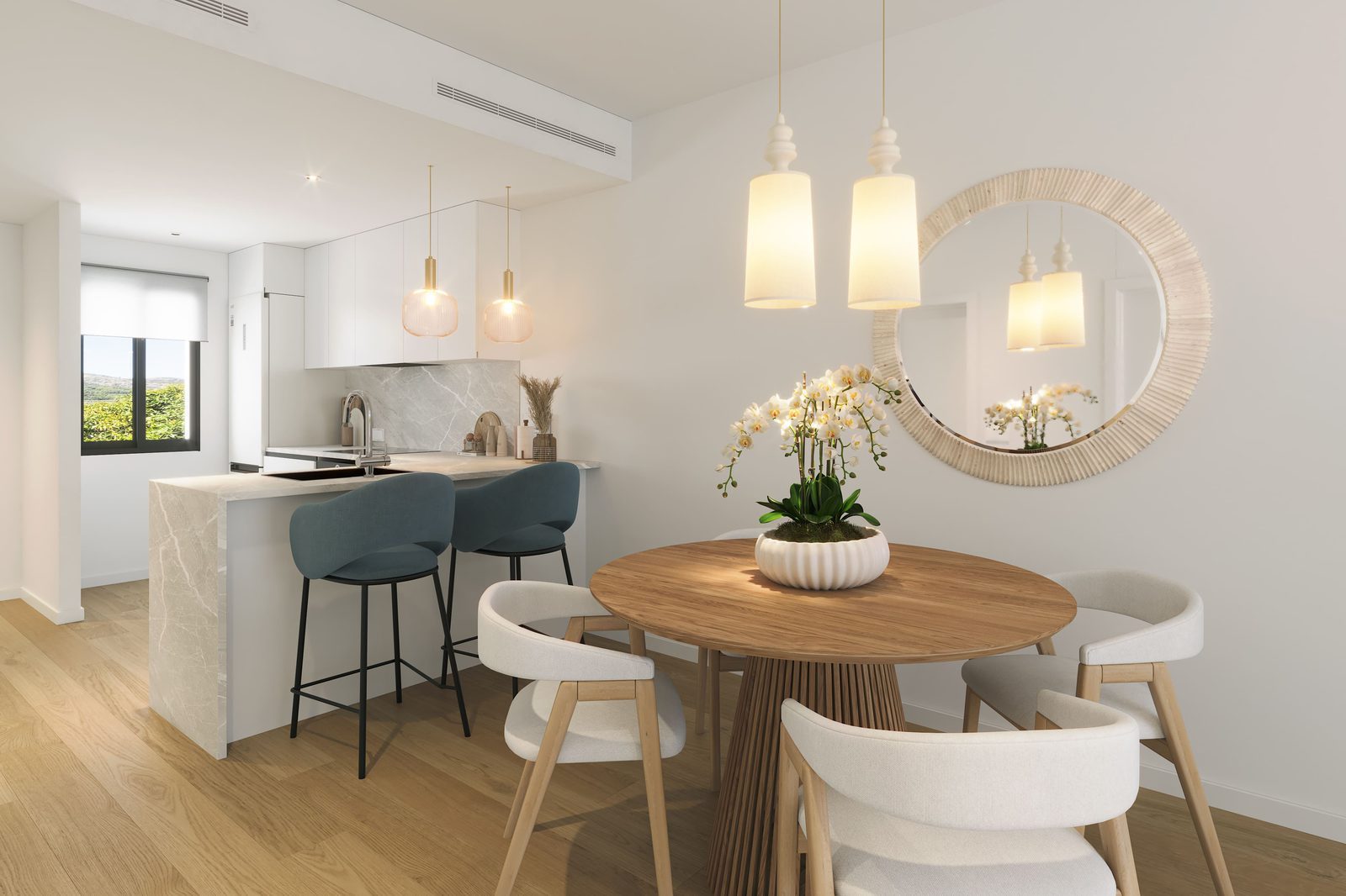Stylish dining area with a round table and bar stools in a 2-bedroom apartment in Alfaz del Pi - The Estates