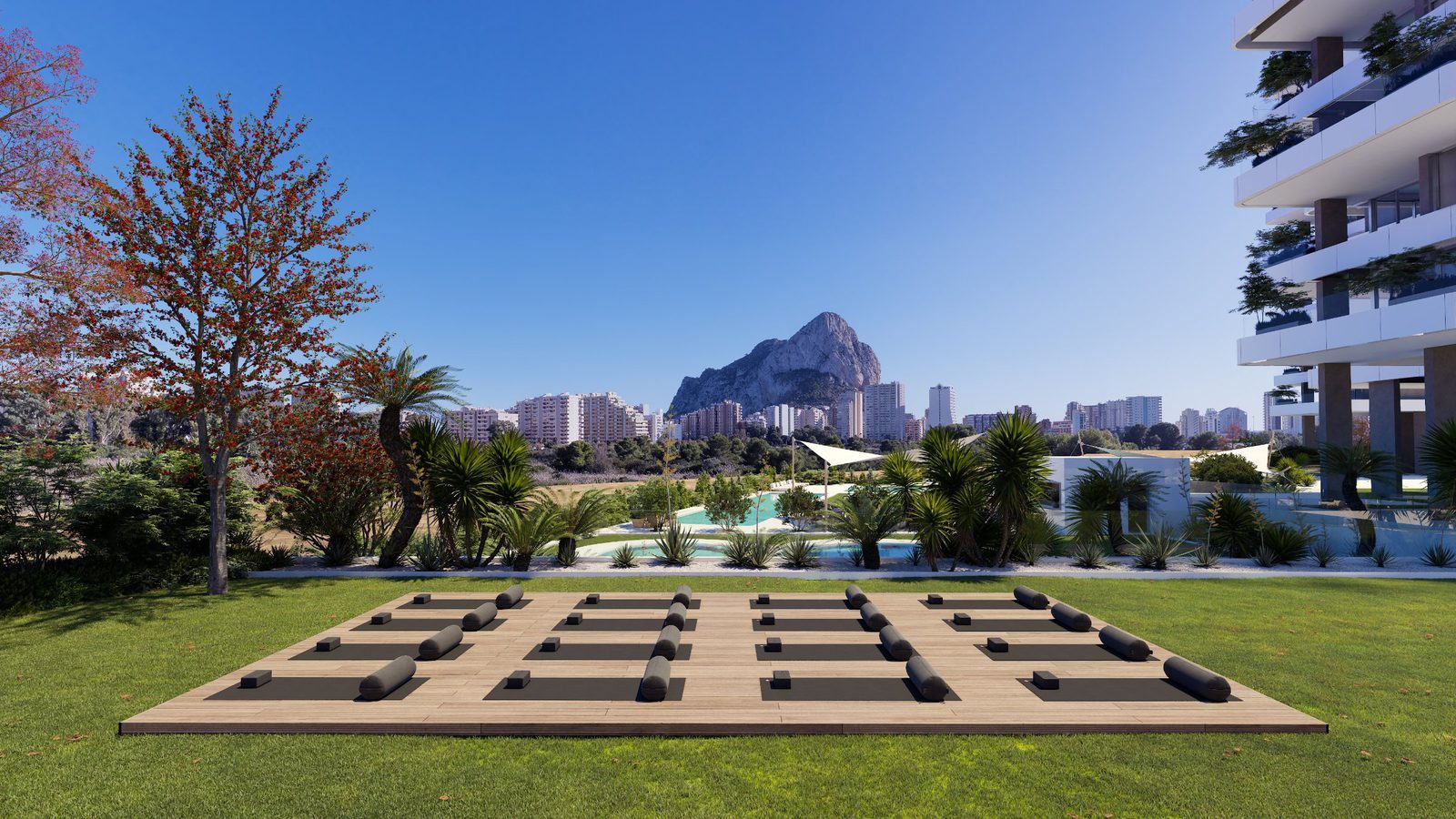 A view of the pool and gardens of a 2-bedroom apartment in Calpe - The Estates