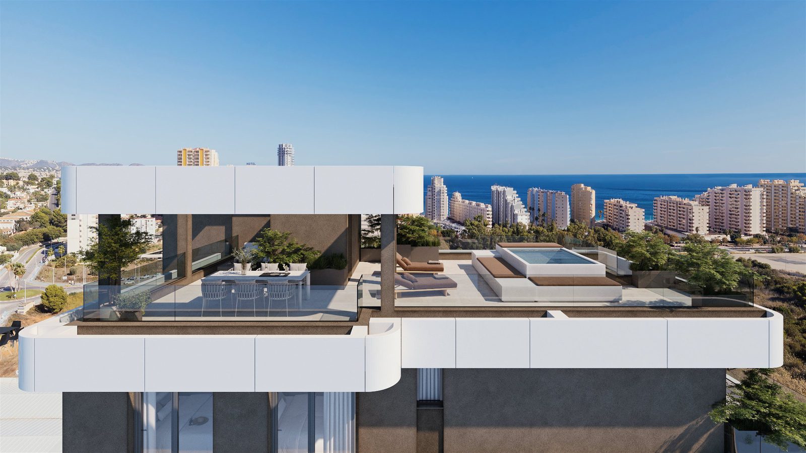 Rooftop terrace with a pool and lounge area overlooking the sea from a 2-bedroom apartment in Calpe - The Estates