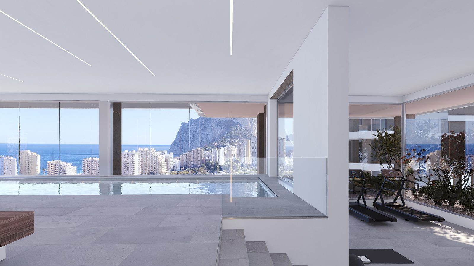 Modern living room with a pool and stunning sea views in a 2-bedroom apartment in Calpe - The Estates