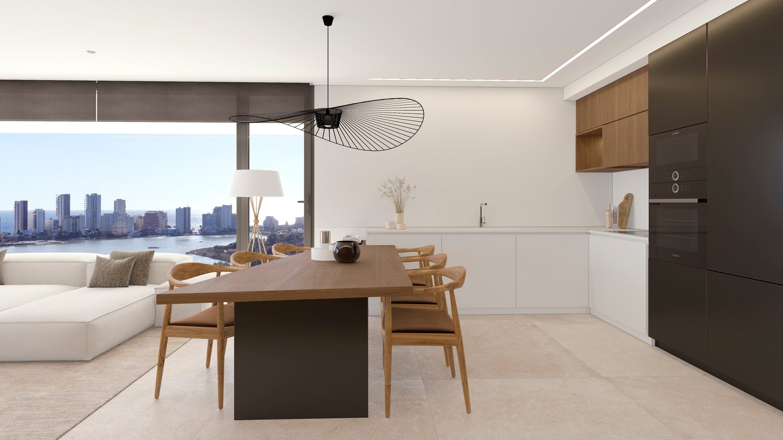 Modern kitchen and dining area with sea views in a 2-bedroom apartment in Calpe - The Estates