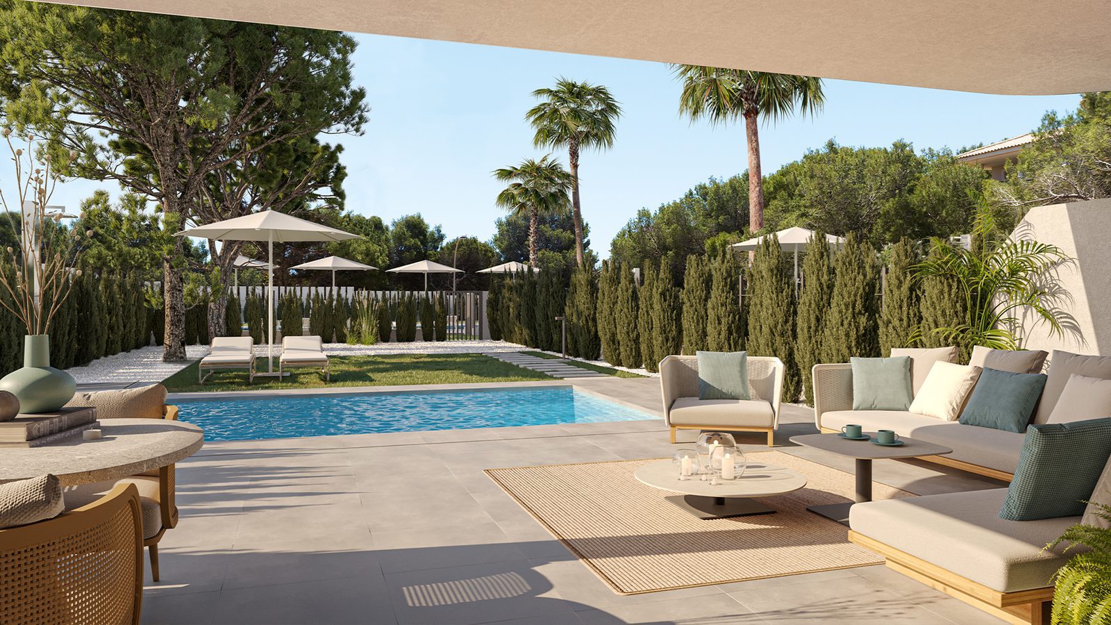 Private pool terrace with outdoor seating and landscaped garden of a 2-bedroom apartment in Capdepera - The Estates