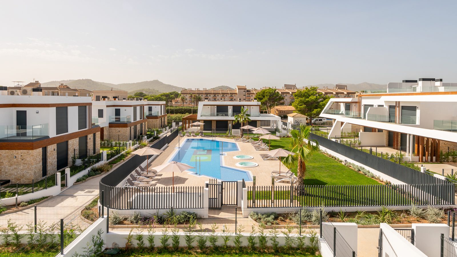 Communal pool and modern homes