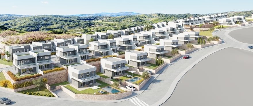 Aerial view of modern villas in a hillside development surrounded by green countryside, Finestrat - The Estates