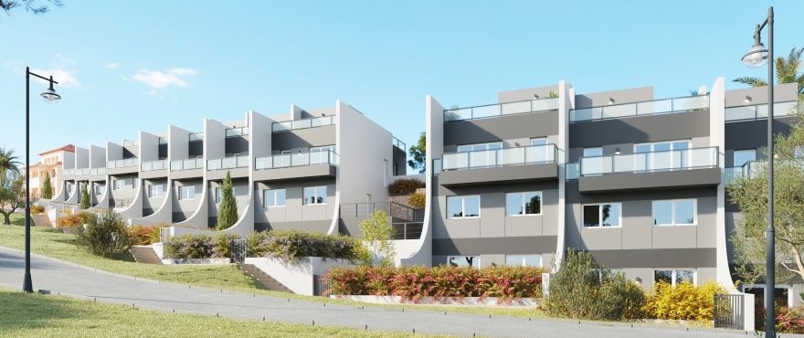Modern row of white and grey villas with terraces and landscaped gardens in Finestrat - The Estates