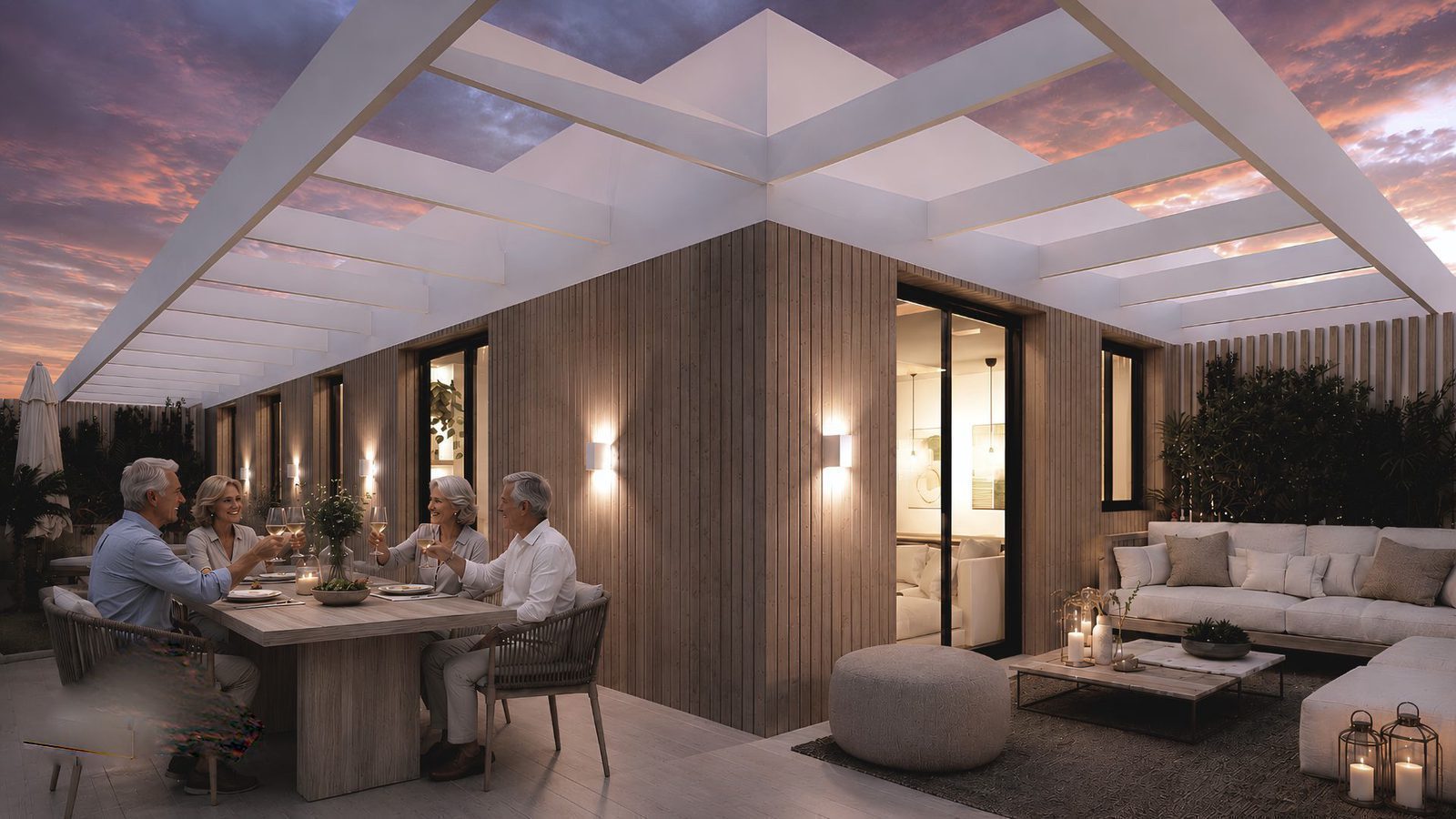 A stylish outdoor dining area with a comfortable lounge on a terrace of a 2-bedroom apartment in Jávea - The Estates