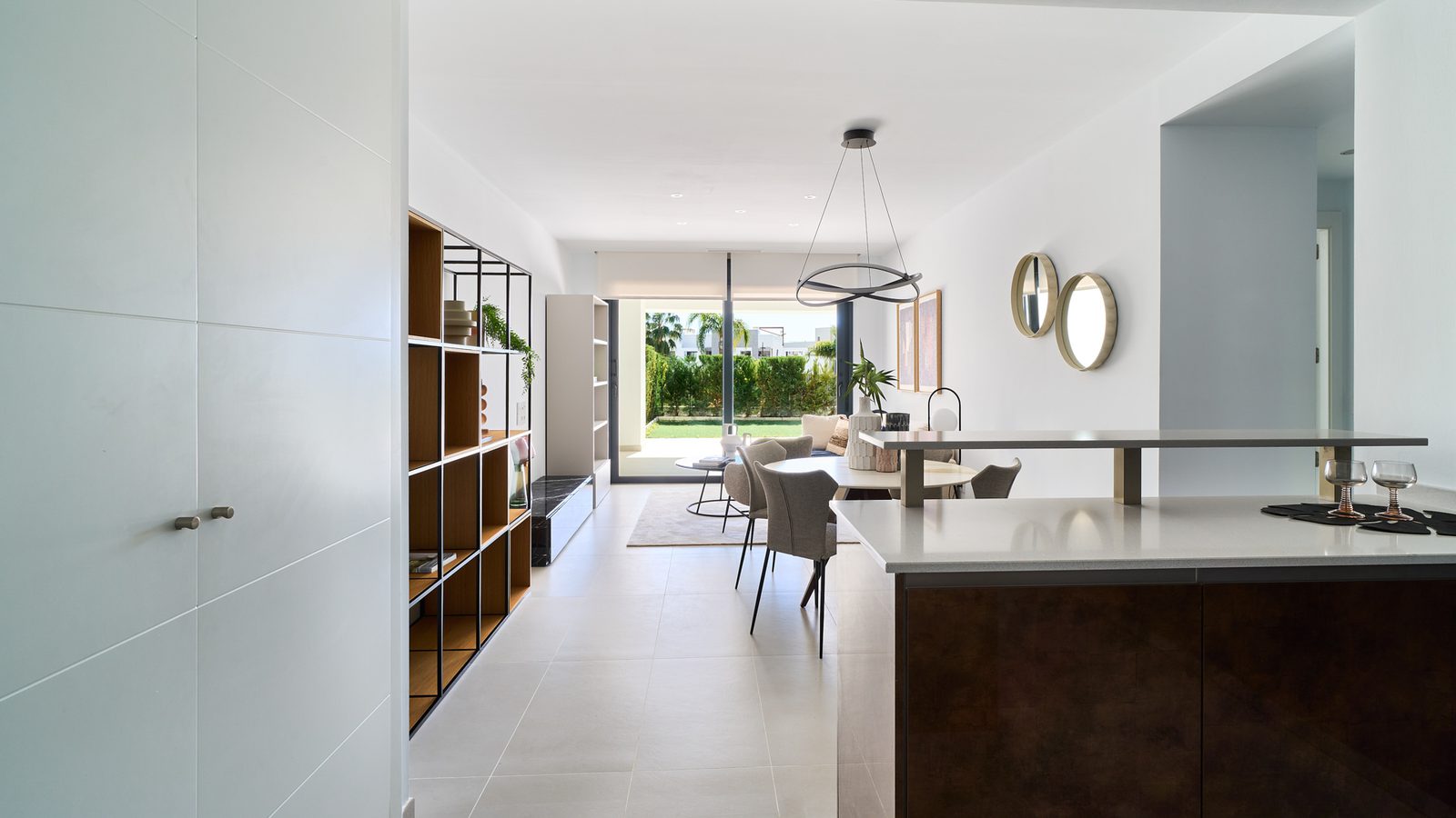 Modern dining and living area of a 2-bedroom apartment in Estepona - The Estates