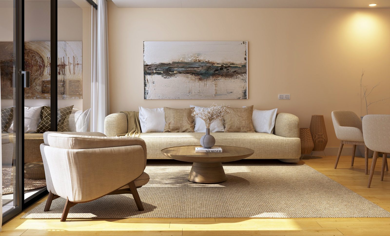 Sunlit living room with sofa, armchairs and abstract art of a 3-bedroom penthouse in Palma - The Estates