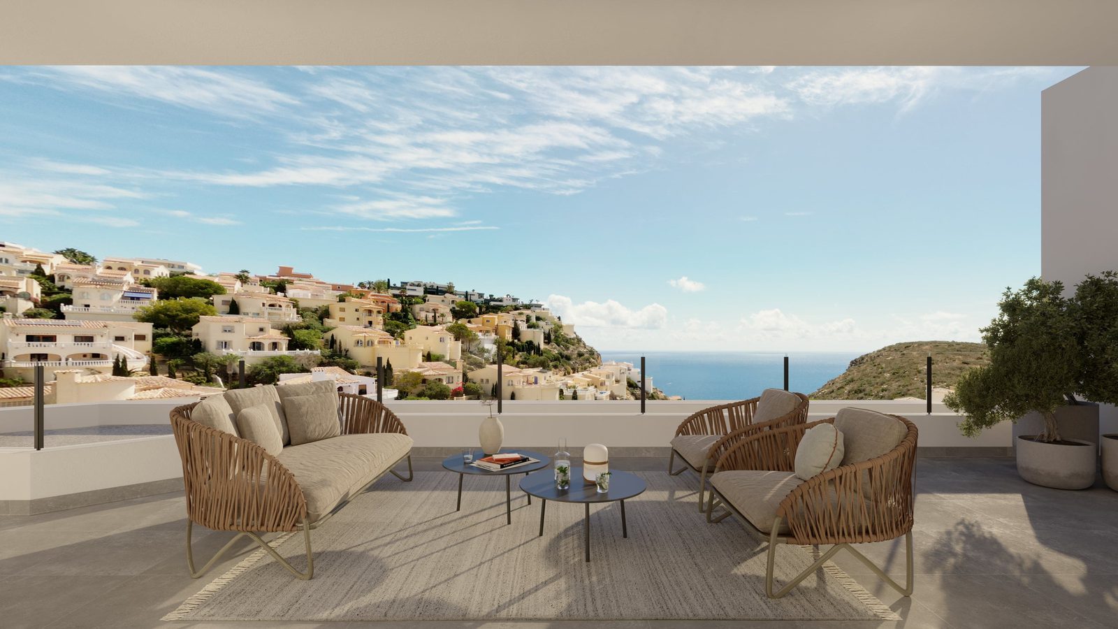 Outdoor lounge area with stunning coastal views of a 3-bedroom apartment in Benitachell - The Estates