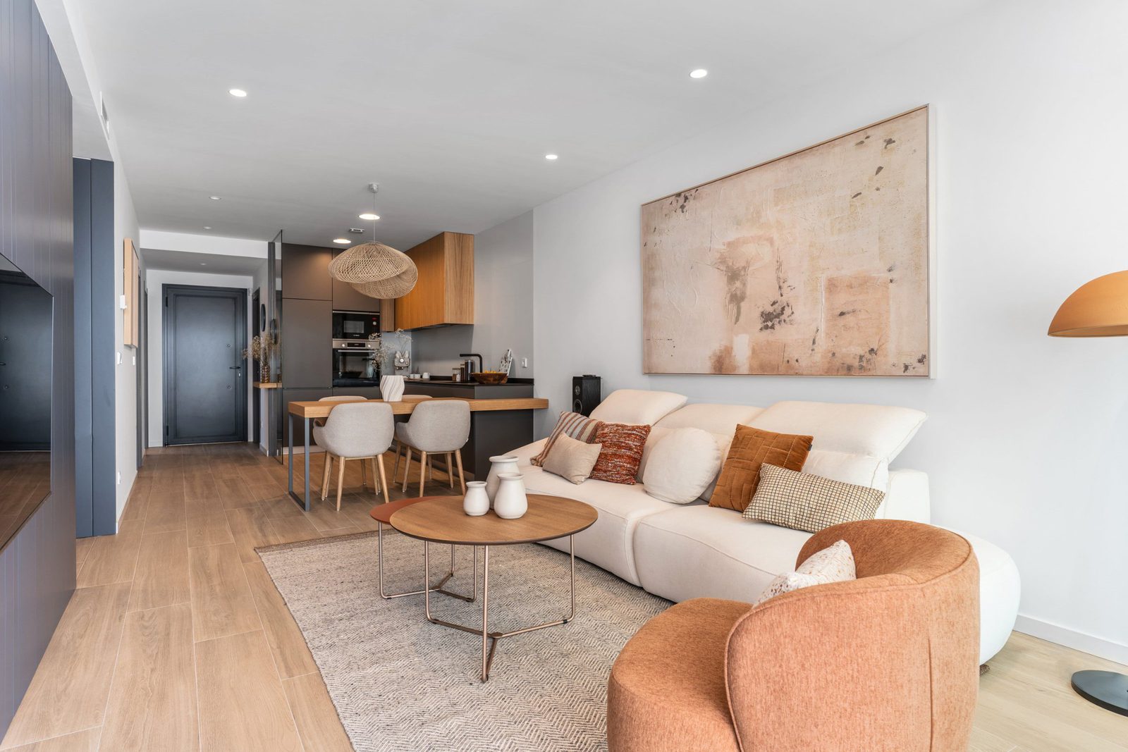 A modern living and dining area of a 3-bedroom apartment in Benitachell - The Estates