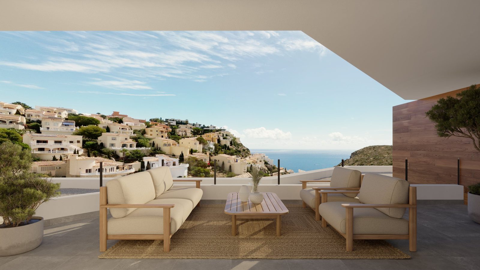 A comfortable seating area with stunning coastal views of a 3-bedroom apartment in Benitachell - The Estates