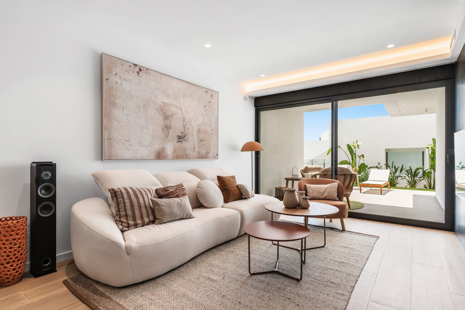 Stylish living room with outdoor access in a 3-bedroom apartment in Benitachell - The Estates