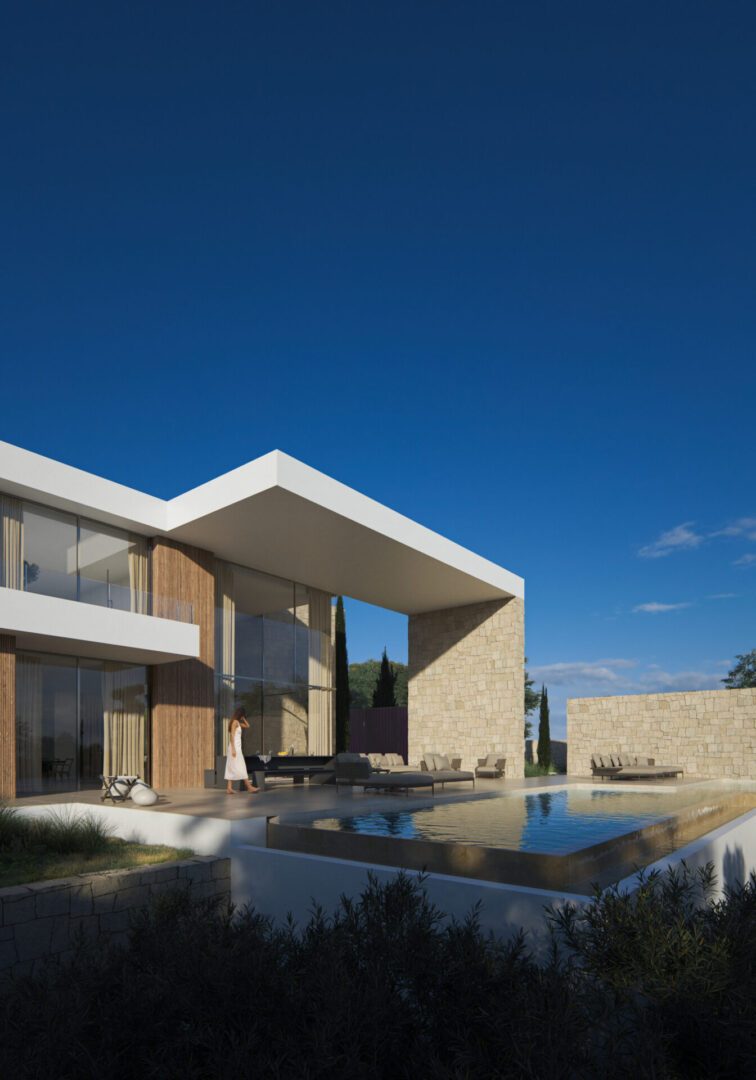 Modern villa exterior with infinity pool and sun terrace of a 4-bedroom villa in Moraira - The Estates