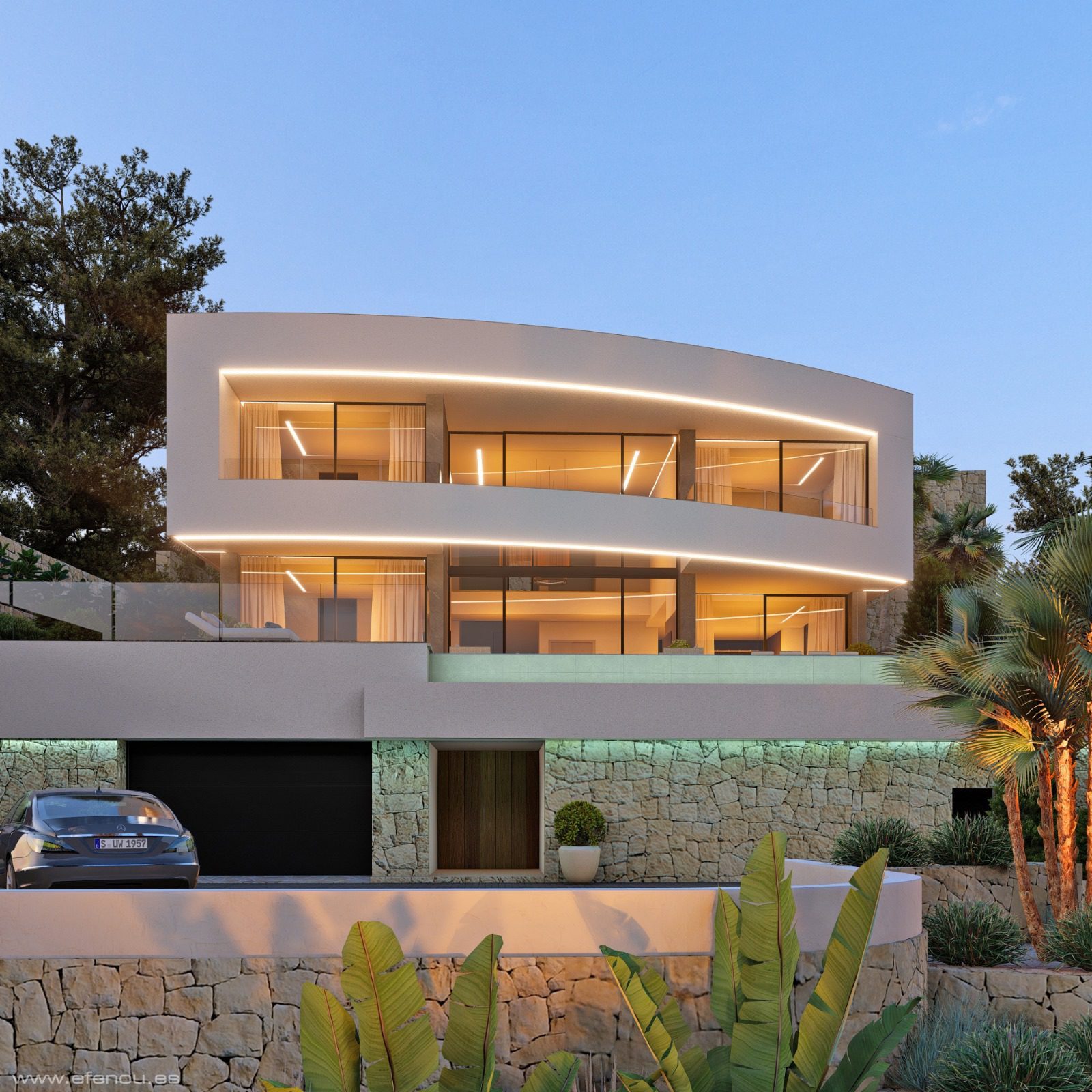 Contemporary illuminated villa facade with glass balconies, stone walls and tropical landscaping of a 4-bedroom villa in Calpe - The Estates