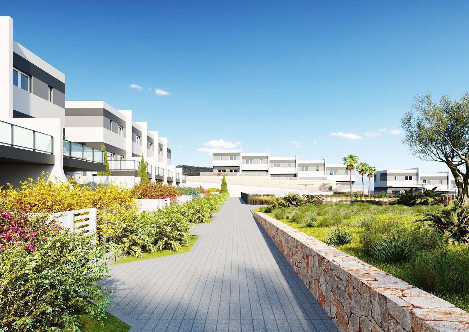 A pathway leads past lush gardens surrounding a 3-bedroom townhouse in Finestrat - The Estates