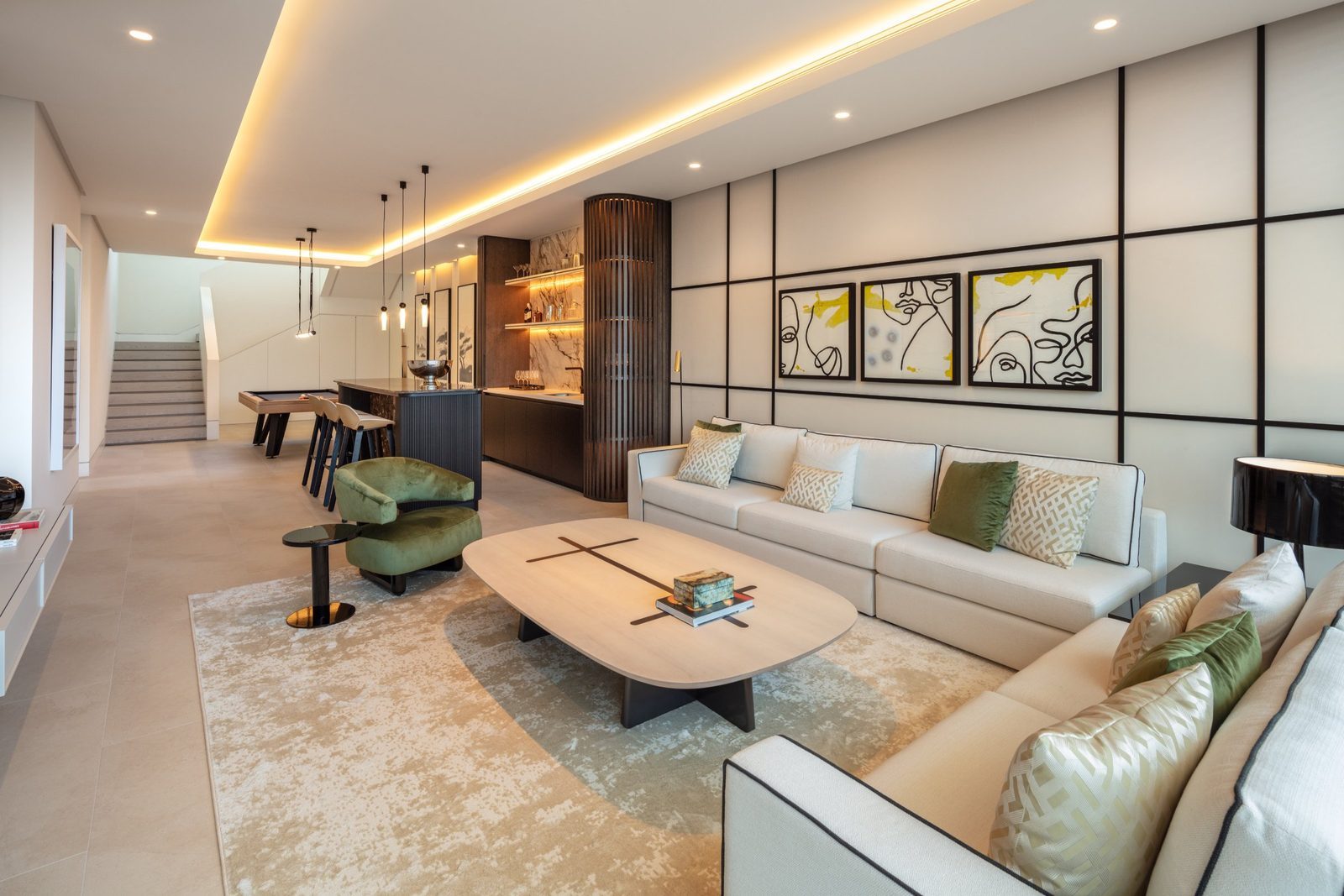 Contemporary living room with open kitchen, bar and pool table of a 7-bedroom villa in Málaga - The Estates